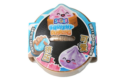 Squishy Dumpling Glitter i emballasje – rosa glitterdumpling i bambuskurv, 9 cm