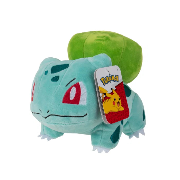 Bulbasaur Pokémon kosedyr detalj – nærbilde av brodert ansikt og grønn pels med blå prikker