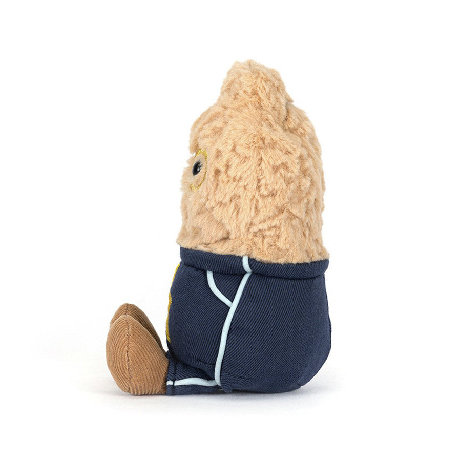 Jellycat Amuseables Peanut Star Student detalj – nærbilde av smilende ansikt og studentlue