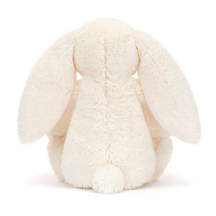Jellycat Blossom Cream Bunny Berry detalj – nærbilde av brodert ansikt og blomster-aksent