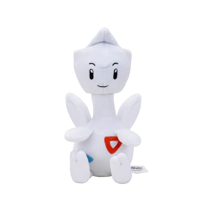 Togetic Pokémon kosedyr detalj – nærbilde av brodert ansikt og røde og blå trekantmønstre
