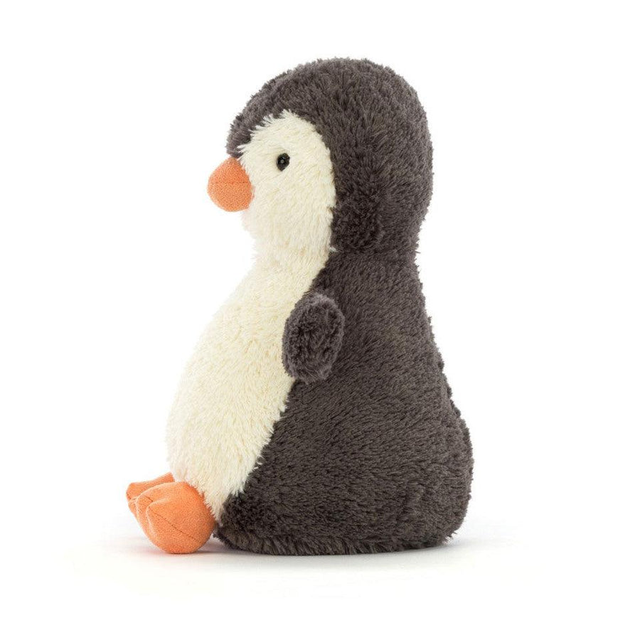Jellycat Peanut Penguin detalj – nærbilde av broderte øyne og gult nebb